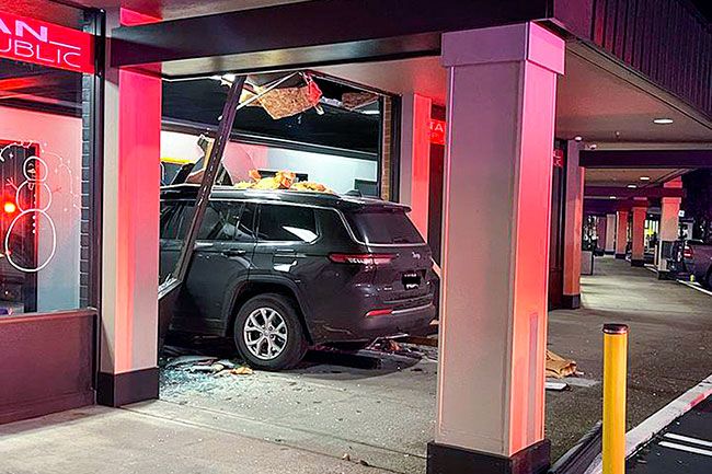 McMinnville Police Department photo##A 2002 Jeep SUV crashed through the front of McMinnville’s Excell Fitness and Tropical Tan, located in the Town Center on Wednesday, Dec. 27. The driver was not injured.