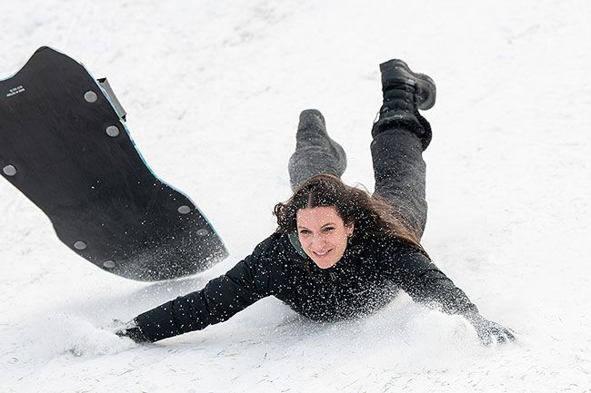 ##Sara Tucholsky doesn’t seem to mind too much as she unceremoniously dismounts from her flying sled. She headed back up for another run.
