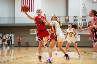 Rachel Thompson/News-Register##McMinnville’s Macie Arzner recorded 26 points in three quarters against Forest Grove, helping the team move to 16-2.