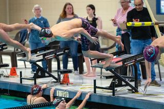 Rusty Rae/News-Register file photo##Michael Khoury dives into the pool during the meet against Glencoe.