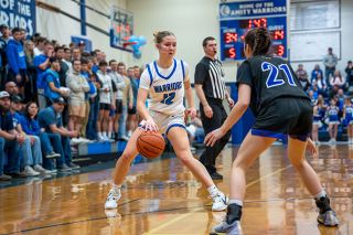 Rachel Thompson/News-Register##Amity sophomore Eliza Nisly finished the second round playoff game against Horizon Christian, Tualatin with 20 points.