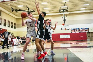 Tanner Russ/News-Register##Dayton junior Clyde Rosenberg (51) recorded 37 points in the Pirates’ second round matchup against the Douglas Trojans. Dayton beat Douglas 66-50 to advance to the state semifinals against Valley Catholic.