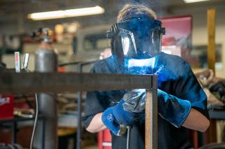News-Register file photo##In April 2024, just after Dayton High School opened its new CTE facilities in the shop/agriculture wing of the school, then-freshman Royal Carlson welds a frame for a table that will hold plants in the school greenhouses. Teachers said students enjoy seeing their work put into real-world use.