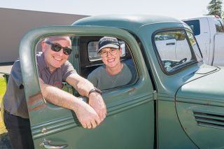 Rusty Rae/News-Register##Scott and Elizabeth Hinchcliff enjoy riding in their 1938 Ford pickup. Scott, a master mechanic at Scott’s Automotive in McMinnville, said he believes vehicles are meant to be driven, so he uses the vintage truck on a regular basis.