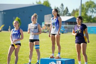 Rachel Thompson/News-Register##Amity junior Mya Haarsma (middle) and Sheridan s Chloe Ayala (right) qualified for the 3A state meet.