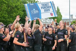 Rusty Rae/News-Register##Linfield softball celebrates its Super Regional victories over Central.