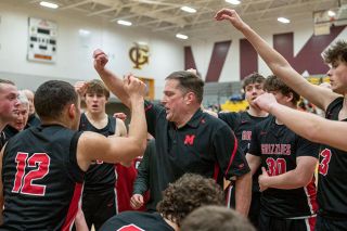 Rachel Thompson/News-Register file photo##McMinnville head coach Willie Graham is stepping away from his role with the boys basketball team after 20 years.