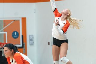 Rachel Thompson/News-Register file photo##Yamhill Carlton sophomore Kelsie King serves the ball in the season opener.