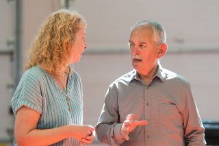 Rusty Rae/News-Register##Les Toth, who has been in the McMinnville Kiwanis Club longer than any other current member, talks with Dawn Owens during a work party meeting in Toth’s barn.