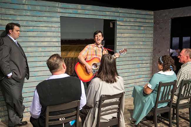 Rusty Rae/News-Register##Songwriter Harold (Nehemiah Creel) performs for friends in “Fly By Night” at Gallery Theater. The show will play at 7:30 p.m. Fridays and Saturdays and 2 p.m. Sundays, Oct. 11 to Nov. 3. For reservations, call 503-472-2227