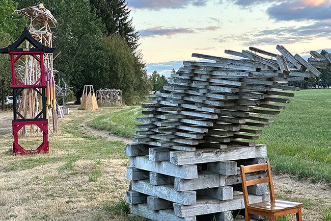 Kirby Neumann-Rea/News-Register##Geometric figures, linear and abstract, kinetic or seemingly so, surround Linfield’s Miller Arts Center.