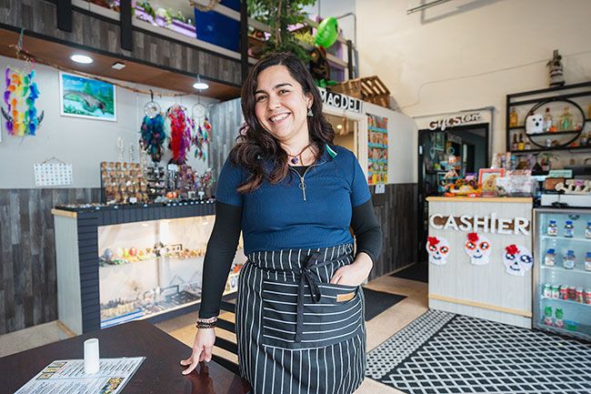 Rachel Thompson/News-Register##Mac Plaza owner Diana Perez, a native of Mexico City, wants to share her culture and learn about other cultures.