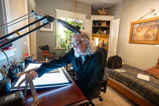 Rachel Thompson/News-Register##McMinnville artist James Dowlen begins creating a piece of work in his home studio. His paintings and prints are often inspired by nature, as well as memories of his travels to Tibet and other parts of the world.