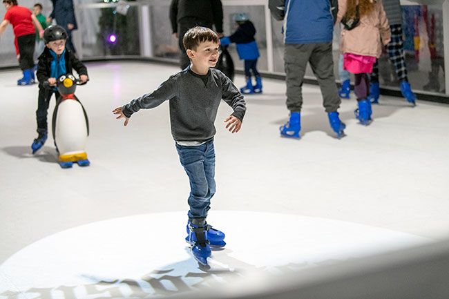 Rusty Rae/News-Register##Lucas Malone of Carlton skates confidently across the center of the McMinnville ice rink Friday, Dec. 13.