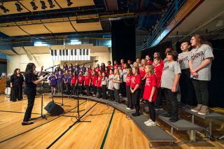 Rachel Thompson/News-Register##A choir made up of elementary school students performs “Rock ‘n Roll Party,” a nod to 1950s and ’60s hits, during Swingin’ on a Star, McMinnville Music Boosters’ annual fundraiser. Wascher, Memorial, Newby and Grandhaven students performed together. Throughout the event, students from elementary, middle and high schools showed off their vocal and instrumental skills. Rachel Thompson/News-Register##A choir made up of elementary school students performs “Rock ‘n Roll Party,” a nod to 1950s and ’60s hits, during Swingin’ on a Star, McMinnville Music Boosters’ annual fundraiser. Wascher, Memorial, Newby and Grandhaven students performed together. Throughout the event, students from elementary, middle and high schools showed off their vocal and instrumental skills.