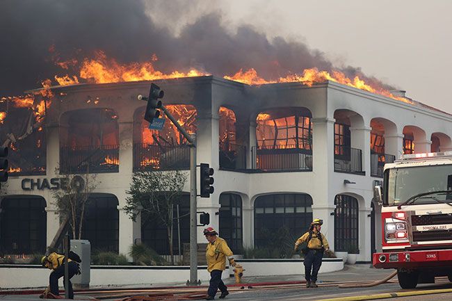 California Department of Forestry and Fire Protection photo##A Chase Bank branch burns Jan. 8 on Sunset Boulevard in Pacific Palisades.