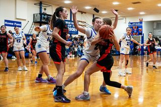 Rachel Thompson/News-Register##Amity sophomore Grace Ulloa denies Willamina freshman Bridgette Manley any space to operate in the fourth quarter of Friday’s PacWest conference game.