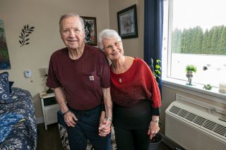 Rusty Rae/News-Register##Kent and Rosie Minor share a moment in their new home, Brookdale City Center. They enjoy having dinner together and just spending time in one another’s company. If there’s a chance for a kiss, they’re all for that, too.