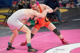 Rusty Rae/News-Register##Devon Huston (150) of Willamina grapples with Cannon Kemper of Burns in the 3A boys state championship finals on Feb. 28 at the Veterans Memorial Coliseum in Portland. Kemper led the match early on and Huston could not recover. Rusty Rae/News-Register##Devon Huston (150) of Willamina grapples with Cannon Kemper of Burns in the 3A boys state championship finals on Feb. 28 at the Veterans Memorial Coliseum in Portland. Kemper led the match early on and Huston could not recover.