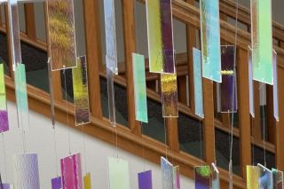 Kirby Neumann-Rea/News-Register##Fragmented light is silent in the atrium at Linfield’s Walker Hall, in Martin Richman’s ambient chandelier.