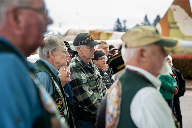 Rachel Thompson/News-Register##Attendees at the Vietnam traveling wall ceremony included veterans, Evergreen volunteers and community members. The wall contains names of Oregon’s fallen soldiers from the Vietnam, Iraq and Afghanistan wars. Rachel Thompson/News-Register##Attendees at the Vietnam traveling wall ceremony included veterans, Evergreen volunteers and community members. The wall contains names of Oregon’s fallen soldiers from the Vietnam, Iraq and Afghanistan wars.