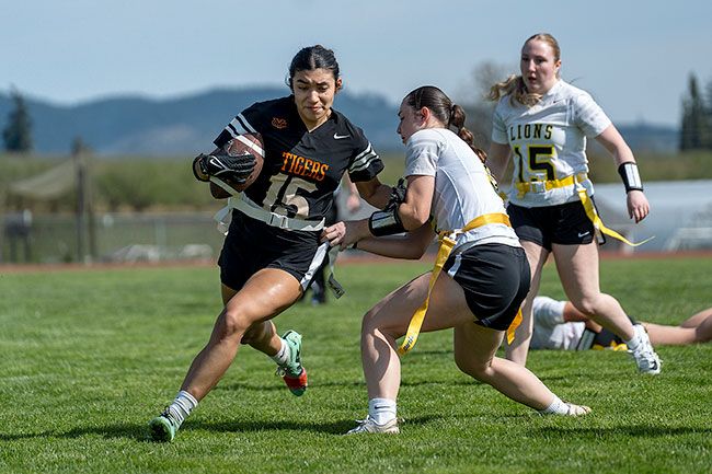 Rachel Thompson/News-Register file photo##Arlette Vilorio rushes past the St. Helens defense during Yamhill Carlton&rsquo;s spring 2025 season opener.
