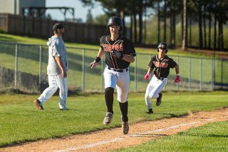 Rachel Thompson/News-Register##Kainan Knapp races to home plate as Nicholas Titular is not far behind after rounding third during the Yamhill-Carlton Tigers’ victory over Scio on Tuesday at home. Both players scored on a double by Parker Davis to put Y-C up 6-3 in the forth inning. Rachel Thompson/News-Register##Kainan Knapp races to home plate as Nicholas Titular is not far behind after rounding third during the Yamhill-Carlton Tigers’ victory over Scio on Tuesday at home. Both players scored on a double by Parker Davis to put Y-C up 6-3 in the forth inning.