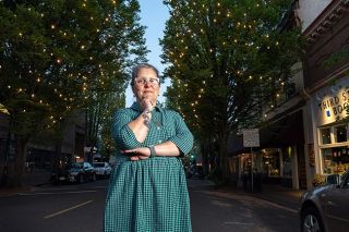 Rusty Rae/News-Register##Woman of the Year Sylla McClellan loves being a small business owner in McMinnville, where she has operated Third Street Books for 21 years. Among her recent community activities was leading the campaign to raise funds to replace the twinkle lights downtown, for which she was honored as “Friend of Downtown” at the McMinnville Downtown Association awards.
