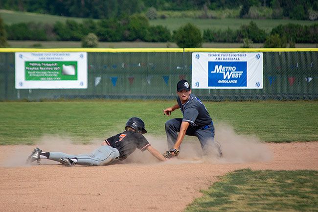 Emily Bonsant/News-Register##Amity shortstop Tyler Petrasek tries to get YC s Nicholas Titular out at second base, but Titular dives in time. Emily Bonsant/News-Register##Amity shortstop Tyler Petrasek tries to get YC s Nicholas Titular out at second base, but Titular dives in time.