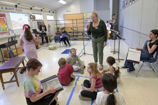 Rusty Rae/News-Register##Robin Pederson directs a rehearsal of “Could You Hug a Cactus?” at Dayton Grade School. The Dayton Music Project is sponsoring the production, and Pederson, who retired after years as McMinnville High School vocal music teacher, is directing along with her husband, Mark Pederson. The free performance will be May 20 in the school.