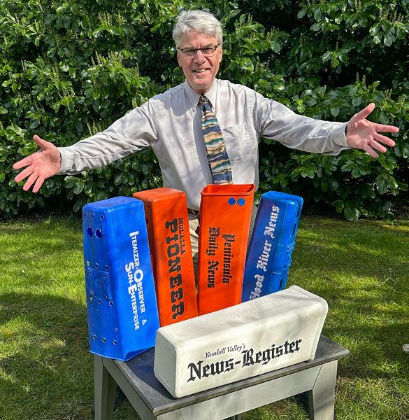 Submitted photo##The author with his collection of delivery tubes from every newspaper in his 44-year career. Submitted photo##The author with his collection of delivery tubes from every newspaper in his 44-year career.