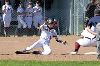 Rusty Rae/News-Register##Vivian Moore successfully slides into second base on a stolen base attempt. She led the Grizzlies with three of the team’s nine steals in their second-round playoff game against Tualatin at McMinnville High School. Rusty Rae/News-Register##Vivian Moore successfully slides into second base on a stolen base attempt. She led the Grizzlies with three of the team’s nine steals in their second-round playoff game against Tualatin at McMinnville High School.