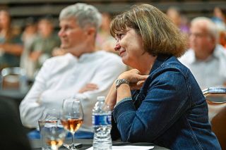 Rusty Rae/News-Register##Kathy Schlotfeldt, outgoing director of MV Advancements listens to tributes to her at her retirement party Wednesday. Scott Larsen, a member of the MVA Board, is in the background. Schlotfeldt is leaving after 10 years as MV Advancements executive director; she will stay on as finance director. Rusty Rae/News-Register##Kathy Schlotfeldt, outgoing director of MV Advancements listens to tributes to her at her retirement party Wednesday. Scott Larsen, a member of the MVA Board, is in the background. Schlotfeldt is leaving after 10 years as MV Advancements executive director; she will stay on as finance director.