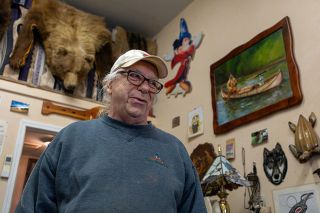 Rachel Thompson/News-Register##Artist Bob Frosty talks about the paintings and other art, as well as items such as furs from a bear and other animals, that hang in his Eagles Nest Gallery. His is selling the contents. Rachel Thompson/News-Register##Artist Bob Frosty talks about the paintings and other art, as well as items such as furs from a bear and other animals, that hang in his Eagles Nest Gallery. His is selling the contents.