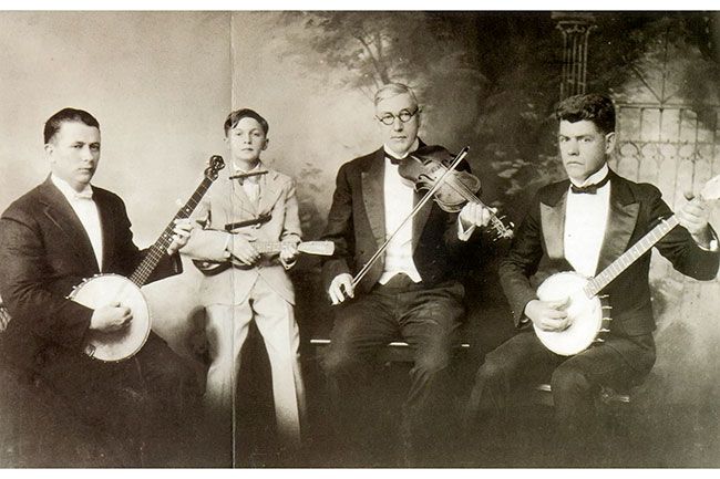 Image: Blue Ridge National Heritage Area##DaCosta Woltz’s Southern Broadcasters pose for a publicity photo at their 1927 recording session at Gennett Records. Pictured are DaCosta Woltz, Price Gordon, Ben Jarrell and Frank Jenkins.