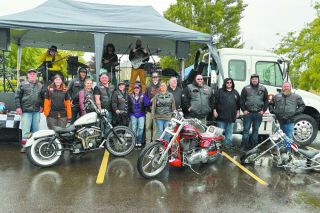 The Baker Creek Harley Race Team gathers in front of the main stage outside of the Willamette Valley Birthing Center during Bikestock 1 on Saturday, June 21. 
Photo courtesy of Nicole Evans