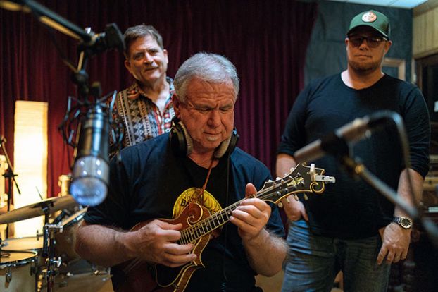 Rachel Thompson/News-Register##Joey McKenzie plays his mandolin during a recording session at Rorschach Studio in McMinnville, which is owned by his longtime friend Keith Sommers, right, who is in the background with another old friend, Jon Sherwood, who is making an EP of several new country-influenced songs.