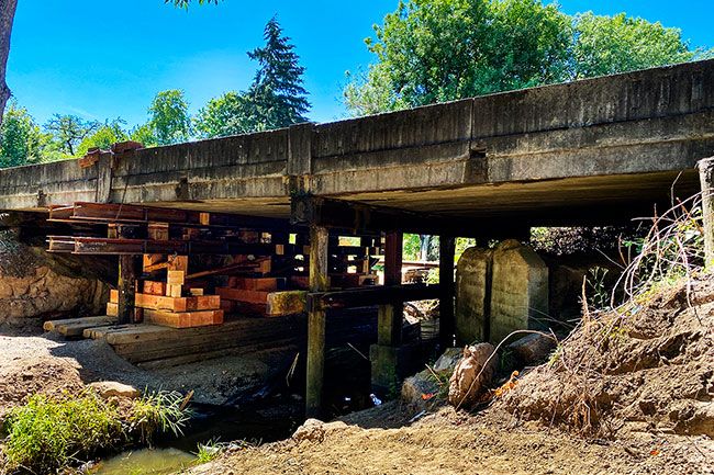 Starla Pointer/News-Register##Traffic is flowing again over the Hawn Creek Bridge at the east edge of Carlton. Crews shored up the bridge after finding a damaged support beam, which led to reduced speed for several months. The bridge carries hundred of vehicles per day heading to and from Carlton from Hendricks Road. Starla Pointer/News-Register##Traffic is flowing again over the Hawn Creek Bridge at the east edge of Carlton. Crews shored up the bridge after finding a damaged support beam, which led to reduced speed for several months. The bridge carries hundred of vehicles per day heading to and from Carlton from Hendricks Road.