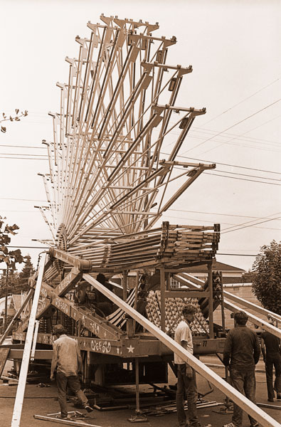 News-Register file photo##(July 9, 1980) Setting up of rides in the parking lot and on Evans Street at Second Street is a good sign Turkey-Rama festivities are about to get underway in McMinnville. The carnival opens tonight, and Mr. and Ms. Turkey-Rama will be selected in a 7:30 p.m. contest at the Town Center, Highway 99W and McDonald Lane. News-Register file photo##(July 9, 1980) Setting up of rides in the parking lot and on Evans Street at Second Street is a good sign Turkey-Rama festivities are about to get underway in McMinnville. The carnival opens tonight, and Mr. and Ms. Turkey-Rama will be selected in a 7:30 p.m. contest at the Town Center, Highway 99W and McDonald Lane.