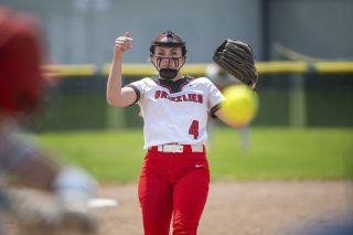 Mackenzie Roberts hurls a pitch toward home plate during Mac’s 5-0 home victory over Westview in the first round of the OSAA 6A softball championship state tournament on Monday, May 26. Roberts pitched three 1/3 innings in relief, surrendering one hit and a walk while striking out five and shutting down a Westview rally with a strikeout of her first faced batter. She was instrumental in leading the Grizzlies, pitching the most of anyone during her senior season.
Rusty Rae/News-Register file photo
