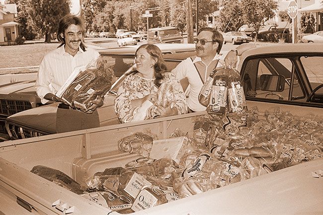 (July 30, 1980)##Several pickup loads of bread were donated Tuesday by the Safeway Supermarket in McMinnville to the Yamhill County Gleaners, for distribution to nonprofit programs and low-income individuals. Helping unload one of the vehicles-full were Bud Schmidt, director of the Community Action Program, Mary Perkins, head of gleaning, and Curtis Noriega, volunteer services supervisor to the adult and family services division of the state Department of Human Resources. Sunshine Dairy donated freezer space to temporarily store some of the bread products. (July 30, 1980)##Several pickup loads of bread were donated Tuesday by the Safeway Supermarket in McMinnville to the Yamhill County Gleaners, for distribution to nonprofit programs and low-income individuals. Helping unload one of the vehicles-full were Bud Schmidt, director of the Community Action Program, Mary Perkins, head of gleaning, and Curtis Noriega, volunteer services supervisor to the adult and family services division of the state Department of Human Resources. Sunshine Dairy donated freezer space to temporarily store some of the bread products.