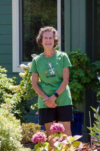 Rachel Thompson/News-Register##Lori Wallick loves all the flowers in her yard, but hydrangeas are her favorite. She has several varieties that bloom in different colors. Rachel Thompson/News-Register##Lori Wallick loves all the flowers in her yard, but hydrangeas are her favorite. She has several varieties that bloom in different colors.