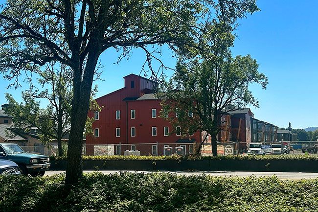 Kirby Neumann-Rea/News-Register##Stratus Village structures are modeled on the historic barn a mile to the east.