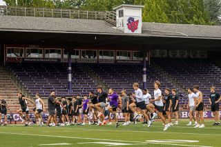 Nathan Ecker/News-Register##The Linfield Wildcats football program had its first official day of practice at historic Maxwell Field on Thursday, Aug. 14. The team began with agility training and emphasized proper movement and stretching as players followed along with their assistant coach Nicholas Kernaghan. Head Coach Joseph Smith said the start of camp can be difficult for some players, especially first years who are still getting settled on campus. “Everything is new, but today at least they’re getting to do what they love and that’s football,” Smith said. The Wildcats departed more than 40 players from the roster, but Smith is excited at the prospect of having a plethora of players who have room to develop their game. “We’re far away from being game-ready now, but we will be. It’s just a matter of when we get there,” Smith said. “The ceiling for this team is quite high.” Linfield opens the season against UW-Oshkosh at home on Sept. 6. Nathan Ecker/News-Register##The Linfield Wildcats football program had its first official day of practice at historic Maxwell Field on Thursday, Aug. 14. The team began with agility training and emphasized proper movement and stretching as players followed along with their assistant coach Nicholas Kernaghan. Head Coach Joseph Smith said the start of camp can be difficult for some players, especially first years who are still getting settled on campus. “Everything is new, but today at least they’re getting to do what they love and that’s football,” Smith said. The Wildcats departed more than 40 players from the roster, but Smith is excited at the prospect of having a plethora of players who have room to develop their game. “We’re far away from being game-ready now, but we will be. It’s just a matter of when we get there,” Smith said. “The ceiling for this team is quite high.” Linfield opens the season against UW-Oshkosh at home on Sept. 6.