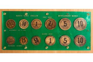Image: Stephen Album Rare Coins##This collection of North Bend myrtlewood coins was sold in an online auction in 2021 for $2,600. Image: Stephen Album Rare Coins##This collection of North Bend myrtlewood coins was sold in an online auction in 2021 for $2,600.