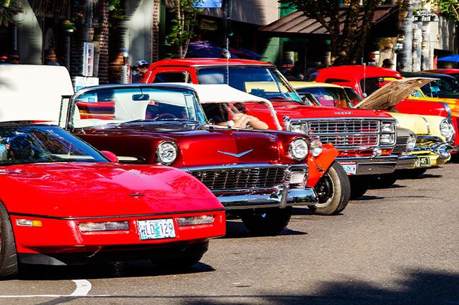 Rachel Thompson/News-Register##Bright paint and gleaming chrome catch the sunlight during the car show. Rachel Thompson/News-Register##Bright paint and gleaming chrome catch the sunlight during the car show.