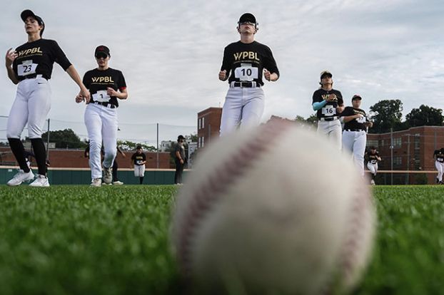 Julia Demaree Nikhinson/AP Photo (used with permission)##Players warm up during the third day of tryouts for the Women’s Professional Baseball League on Aug. 24 at the Washington Nationals Youth Baseball Academy in Washington, D.C.