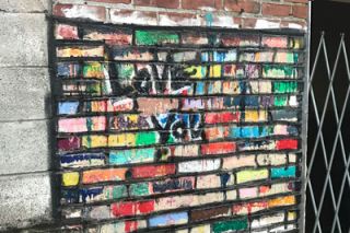 Kirby Neumann-Rea/News-Register##Before it was Art Alley, someone started painting old bricks with bright colors.