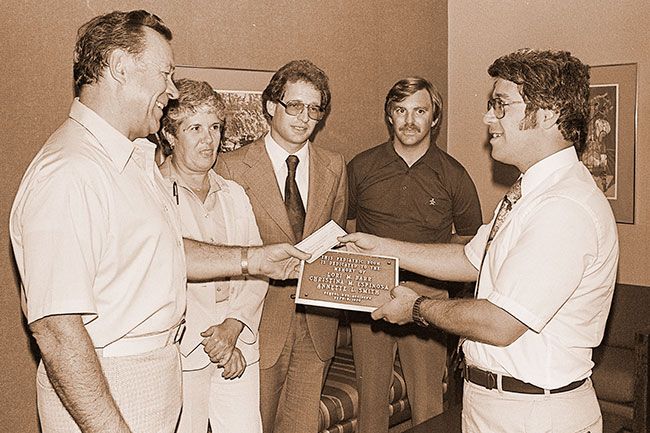 (Sept. 15, 1980) A new pediatric room at McMinnvilIe Community Hospital has been dedicated to the memory of three McMinnville children who died in a 1976 school bus accident in Lafayette — Lori M. Barr, Christina M. Espinosa and Annette L. Smith. Gene Allison, left, superintendent of the Yamhill County Education Service District, hands a dedication plaque to hospital Administrator Gary Worrell. Allison chaired a committee to handle a community fundraiser to help the families of students who were in the Sept. 8, 1976, crash in which a locomotive rammed a McMinnviIle school bus. Behind them are Allison’s ESD administrative assistant, Thelma Taskinen, and committee members Steve Macy and Jeb Bladine. The committee dispersed $2,705 to the families of accident victims for a wide variety of household needs. Much of the fund was raised through a Lafayette drive coordinated by Tom Torrence.