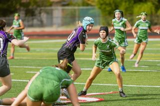 Mac High School transfer student Ava Kowitz takes the ball downfield for the Valley Panthers rugby team in a match against Summit at Wortman Stadium on Sept. 27.##Nathan Ecker/News-Register Mac High School transfer student Ava Kowitz takes the ball downfield for the Valley Panthers rugby team in a match against Summit at Wortman Stadium on Sept. 27.##Nathan Ecker/News-Register